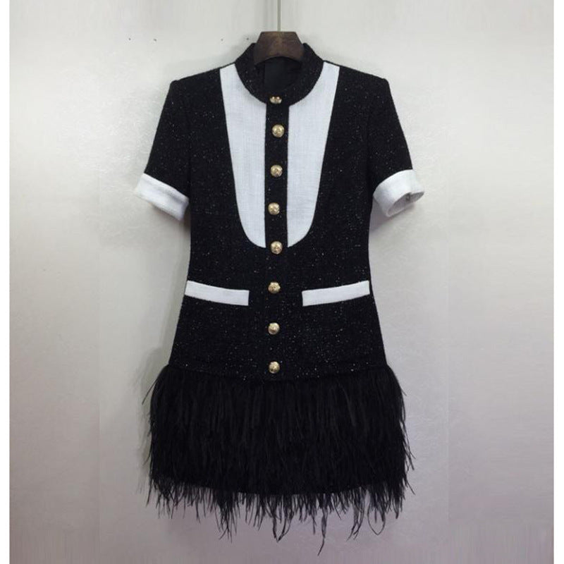 Europe and The United States autumn winter star women fashion metal buckle black and white clash-color hem stitching feather dress