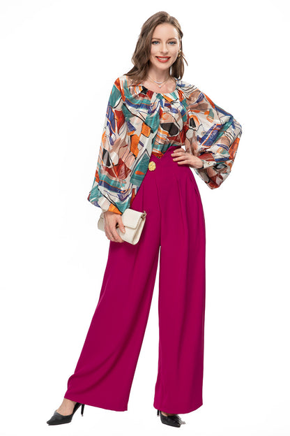 Chic French-inspired set: fashionable printed top and wide-leg trousers, perfect for a stylish, elegant look.