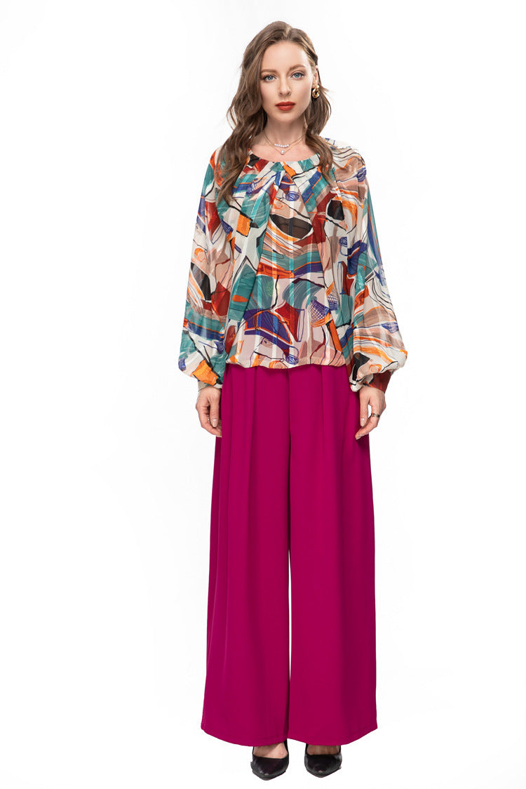 Chic French-inspired set: fashionable printed top and wide-leg trousers, perfect for a stylish, elegant look.